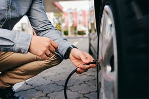 checking tire pressure