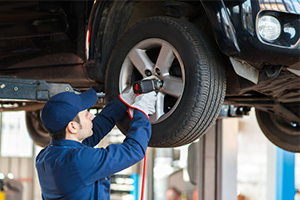 mechanic fixing tires