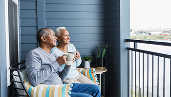 retirees on balcony