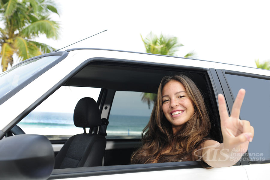 Car Rental: Happy Woman In Her Car Near The Beach